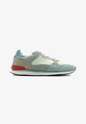 Light grey and mint green suede sneakers with a white mesh upper, red heel accent, and black rubber sole. Lace-up closure.