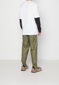 adidas Originals Träningsbyxor - olive