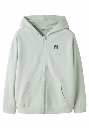 Felpa con cappuccio grigio chiaro con zip, tasche frontali, polsini e orlo a coste, piccolo logo scuro sul petto a sinistra e cappuccio.