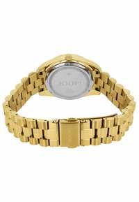 Goldfarbene Metallarmbanduhr mit flachem, rundem Gehäuse, strukturiertem Kronenverschluss und Gliederarmband. Reflektierende Oberflächenakzente und gravierte Rückseite.