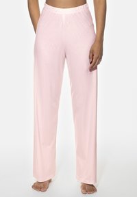 Ljusrosa pyjamasbyxor med vertikala vita ränder, elastisk midja och lös, rak passform. Mjukt tyg med slät textur.