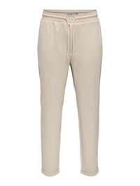 Beige sweatpants made of soft cotton blend. Features an elastic waistband with drawstring, side pockets, and rolled hems.