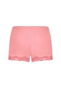 Rosa katoenen shorts met golvende kanten rand langs de zoom. Elastische tailleband voor extra comfort. Soepele textuur met een lichte afwerking.