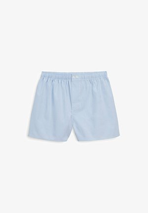 Light blue cotton boxer shorts with an elastic waistband, buttoned fly, and subtle diagonal texture. Simple, functional design.