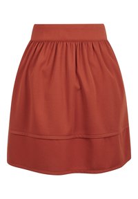 Rostfärgad kjol med en samlad design, som har en bred midjeband och en dekorativ fållkant. Tillverkad av strukturerad tyg.