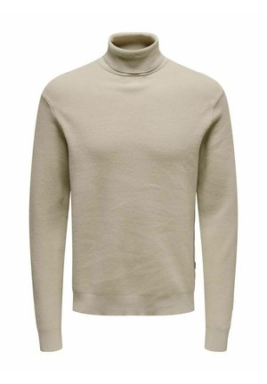 Beige ribbad polotröja med långa ärmar, en figurnära design och en mjuk textur. Har en nederkant vid midjan och manschetter vid handlederna.