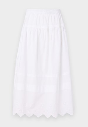 Saia de algodão branca com cintura elástica, apresentando plissados franzidos e bainha com bordas recortadas e detalhes em ilhós ao longo da borda inferior.