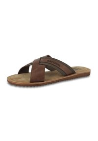 Sandal con fascia in cuoio marrone con cinghie incrociate, soletta imbottita e suola in gomma testurizzata per una migliore aderenza. Nome del marchio "Kaporal" visibile.