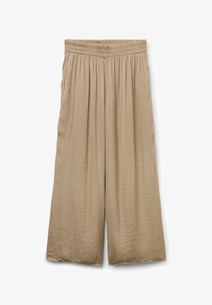 Pantaloni beige a gamba larga con vita elastica e una texture leggermente stropicciata, mostrati su sfondo bianco.