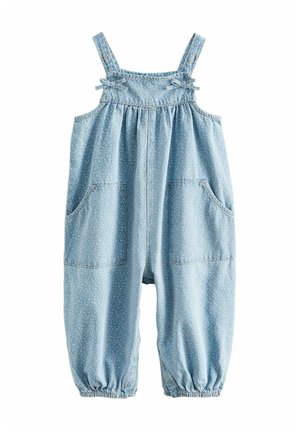Világoskék farmer kisded napozó, apró fehér virágmintákkal, elülső zsebekkel, állítható pántokkal, díszítő masnikkal és rugalmas szegélyes bokarészével.