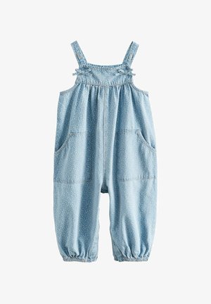 Világoskék farmer kisded napozó, apró fehér virágmintákkal, elülső zsebekkel, állítható pántokkal, díszítő masnikkal és rugalmas szegélyes bokarészével.