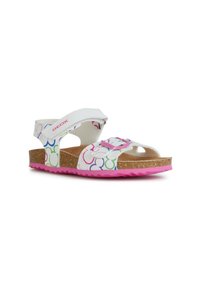 Sandalias blancas con patrones circulares coloridos, plantilla de corcho, correas ajustables y suela de goma rosa. Logo de la marca en el lateral.