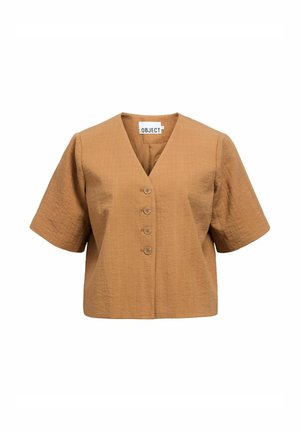 Brun kortermet knappbluse med V-hals og teksturert stoff, vist på hvit bakgrunn.