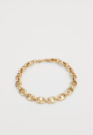 Collana in oro con maglie collegate, lisce e arrotondate, con una finitura lucida. Chiusura semplice per un fissaggio sicuro.