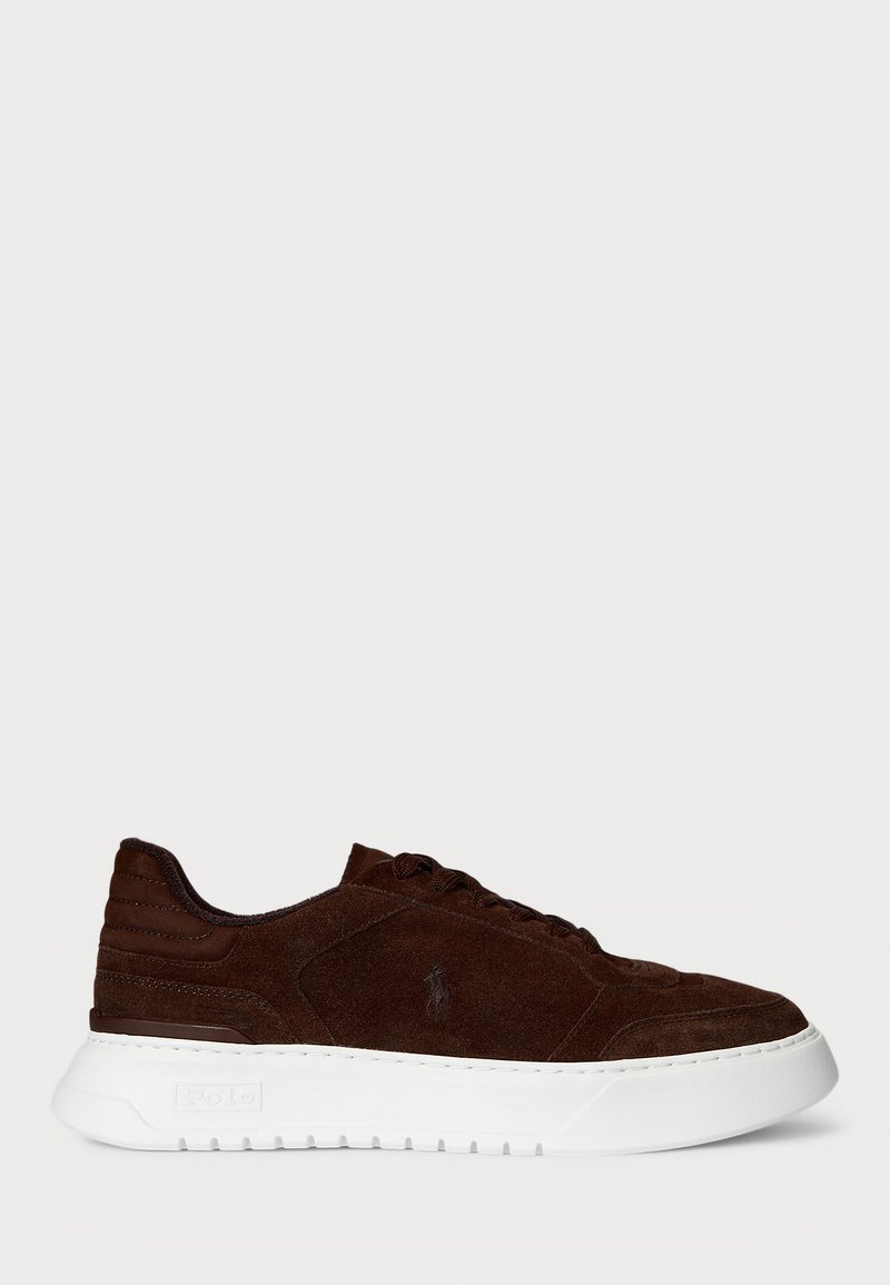Dark brown suede sneaker with white thick sole, lace-up closure, and subtle Polo logo on side, viewed from the outer side.