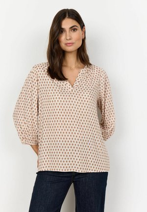 Lightweight, peach-colored blouse with a v-neck, 3/4 sleeves, and a geometric pattern in shades of brown. Soft texture and loose fit.