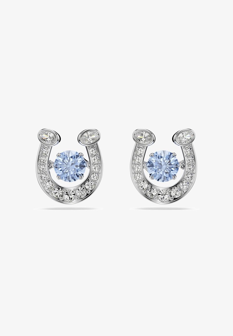 Silver horseshoe-shaped earrings feature blue gemstones at the center, surrounded by smaller clear stones, with a polished, reflective finish.