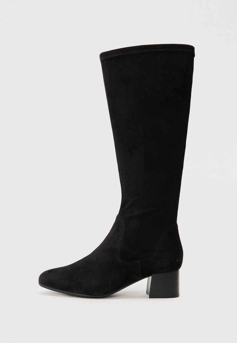 Black knee-high boots made of soft suede, featuring a pointed toe and a block heel. Smooth texture with elastic side panels for fit.
