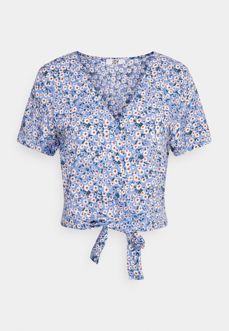 Blouse bleue à manches courtes avec imprimé marguerites blanches et orange, col en V, boutonnage devant et nœud noué à la taille.