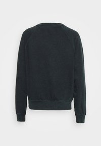 Černá bavlněná mikina se zaobleným výstřihem, dlouhými raglánovými rukávy a žebrovaným pasem a manžetami. Hladká textura, minimalistický design.