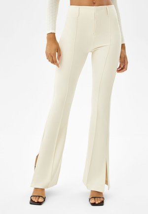 FLARE WITH SPLIT HEMS - Trousers - stone