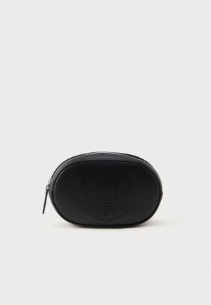 Black leather oval pouch with punched logo detail. Features a top zipper and a embossed design on the front. Smooth texture.