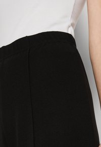Vero Moda VMJADA WIDE PANTS - Bukser - black