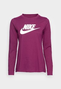 Långärmad lila bomullströja med rundhals och vitt Nike-logotyp över bröstet. Rak fåll och åtsittande ärmar.