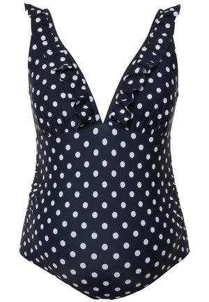 Navy blue polka dot swimsuit with ruffled edges and deep V-neck design. Made from stretchy material, featuring white polka dots and ruching at the sides.
