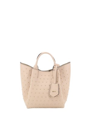 Beige leather handbag with small gold studs, two handles, and a hanging tag embossed with a brand name.