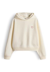 Sweat à capuche court couleur crème avec manches longues et un petit cœur rouge brodé sur le côté gauche de la poitrine.