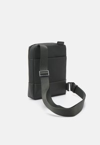 Calvin Klein TECH SENSUAL REPORTER UNISEX - Borsa a tracolla - dark olive