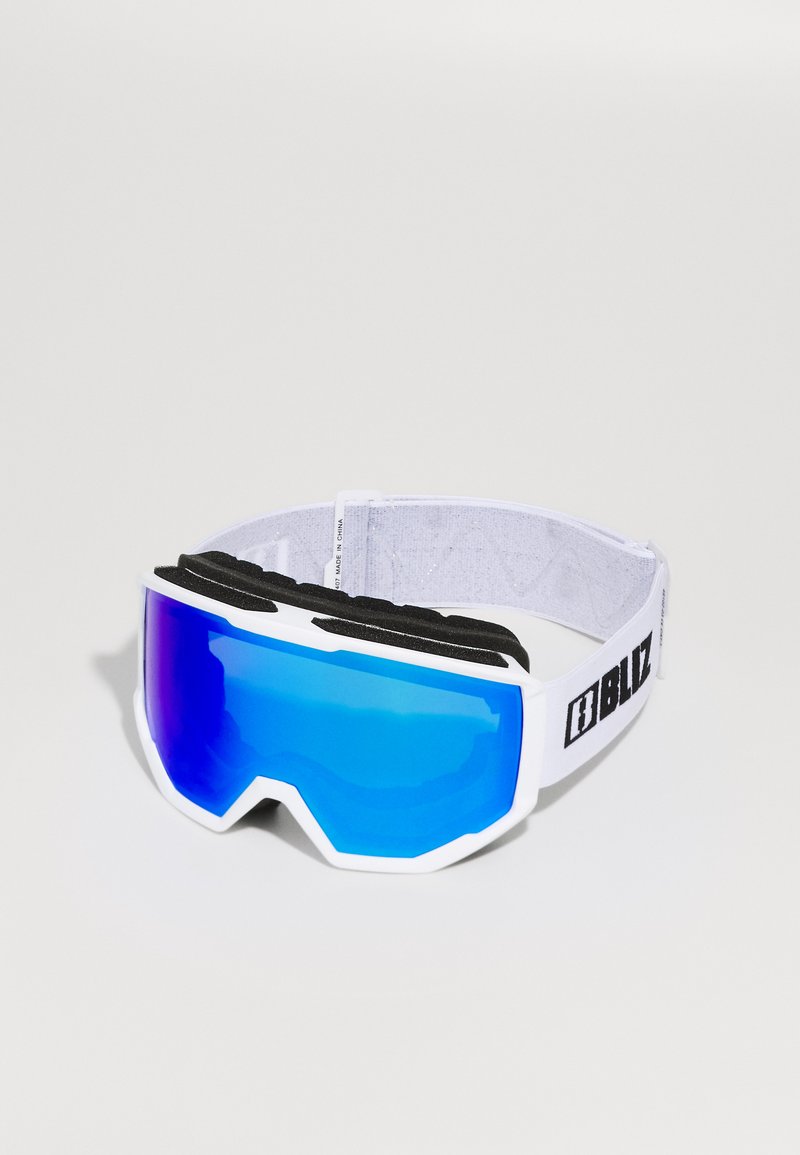 Lunettes avec un cadre blanc, des verres miroités bleus et un rembourrage en mousse noire. Sangle ajustable avec un marquage noir. Convient pour le ski ou le snowboard.