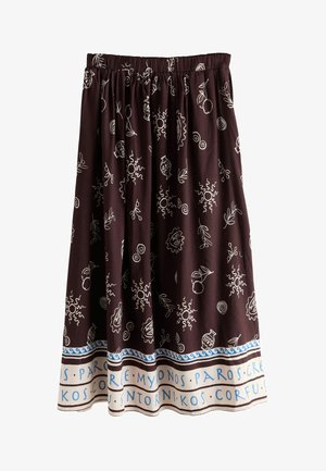 Dunkelbrauner Rock mit weißen abstrakten Mustern und blau gesäumtem Saum mit Namen griechischer Inseln in hellblauem Text.