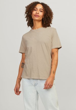 Svetlo rjav bombažni T-shirt z okroglim izrezom in kratkimi rokavi, s sproščenim krojem in minimalnimi šivi.