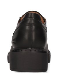 Scarpe in pelle nera con una finitura liscia, dettagli cuciti e una suola nera robusta. Design classico con punta rotonda e un lieve tacco.