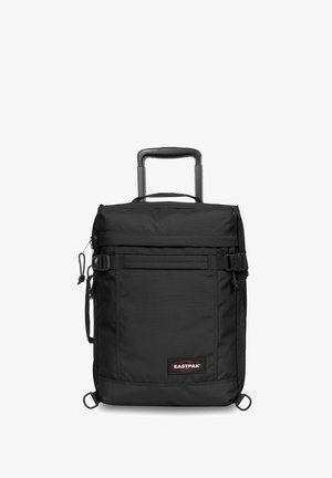 Mustalla pyörärepulla, jossa on suorakulmainen muoto, valmistettu kestävästä kankaasta. Varustettu etutaskulla, säädettävillä hihnoilla ja vedettävällä kahvalla.