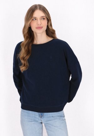 Felpa blu navy realizzata in tessuto morbido, con scollatura ampia e maniche lunghe. Presenta un sottile logo di un'ancora sul petto.
