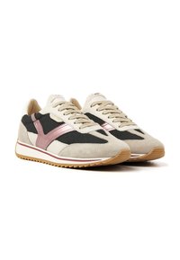 Sneakers in beige suede and mesh with a pink metallic logo, black accents, cream laces, and a textured gum sole. Slim, athletic silhouette.