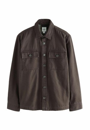 Brun skjorte med knapper og krave, to brystlommer og mørke knapper. Lavet af tekstureret stof med lange ærmer.