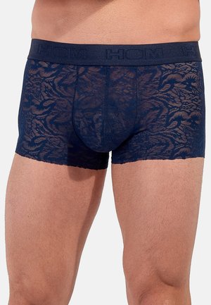 Marineblauwe boxershorts van kant met een gestructureerd bloemenpatroon. Voorzien van een elastische tailleband met "HOM"-branding. Soepele, nauwsluitende pasvorm.