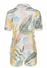 Short-sleeve pajama set in light fabric, featuring a tropical leaf pattern in green, pink, yellow, and blue on a cream background.