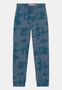 Levi's® TIE DYE RELAXED CORE - Teplákové kalhoty - aegean blue