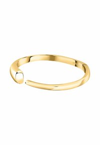 Bracciale cuff in metallo dorato con un design liscio e arrotondato. Presenta un'estremità leggermente conica e una finitura minimalista.