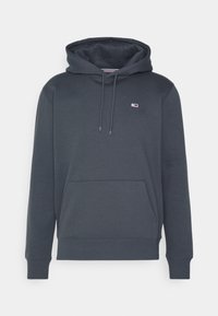 Sudadera con capucha de color gris oscuro con bolsillo tipo canguro en la parte delantera, capucha con cordón, puños acanalados y un pequeño logo rectangular en el lado izquierdo del pecho.