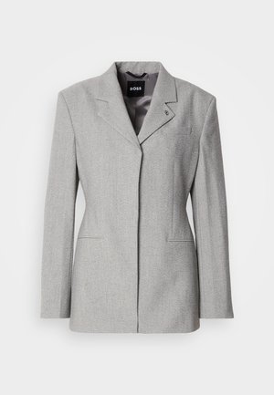 Sivi vuneni blejzer sa strukturiranim ramenima, jednorednim kopčanjem s jednim gumbom i dva prednja džepa. Ima rever s urezom i suptilni logo marke.