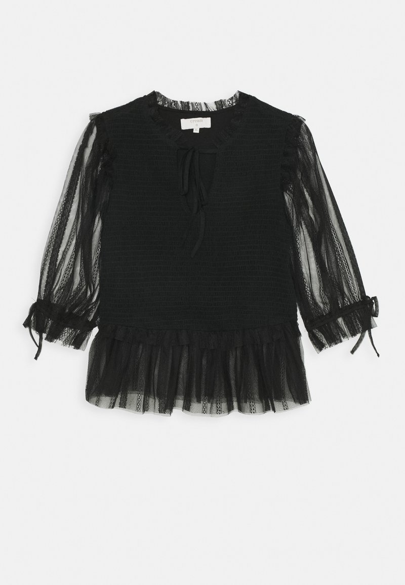 Czarny top z teksturowanej tkaniny, przezroczyste rękawy z tiulu, detal w postaci wiązania przy dekolcie oraz falbaniasty dół. Regulowane mankiety rękawów z wiązaniami.