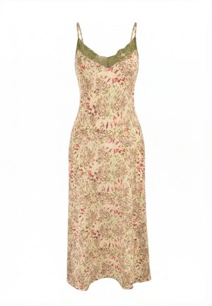 Sleeveless beige slip dress with green lace trim at neckline and multicolor floral pattern throughout, featuring thin shoulder straps.