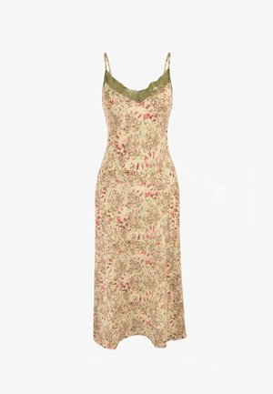 Sleeveless beige slip dress with green lace trim at neckline and multicolor floral pattern throughout, featuring thin shoulder straps.