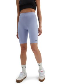 Lila högmidjade cykelshorts i stretchigt material, med en sömlös design och en liten Vans-logga på låret.